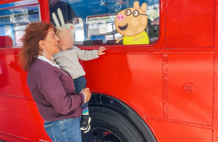 Peppa Pig Afternoon Tea Bus Tour in London, the red double decker bus with Peppa Pig characters in the windows
