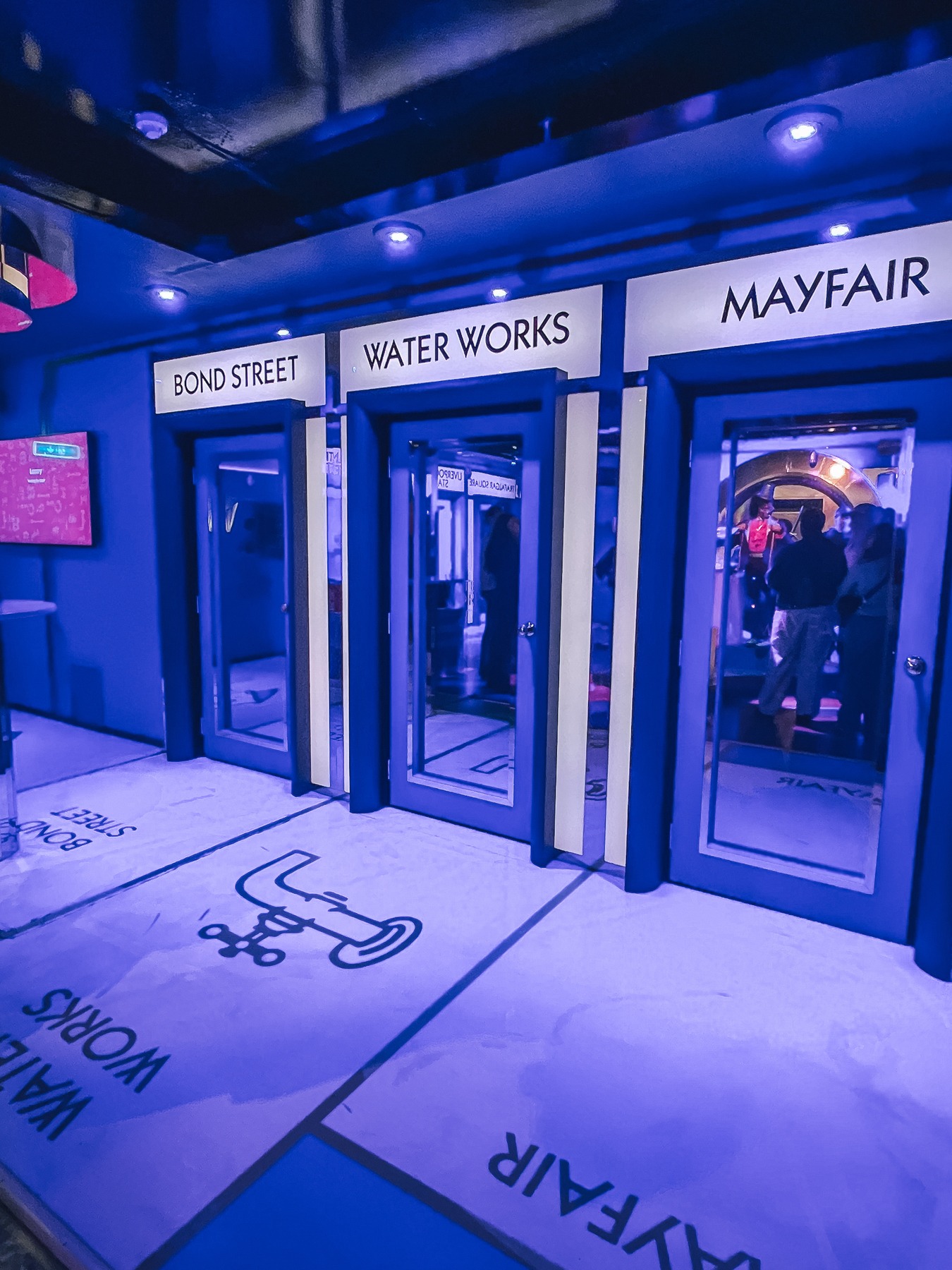 Challenge room doors for Bond Street, Water Works and Mayfair on the lifesized Monopoly board at Monopoly Lifesized London